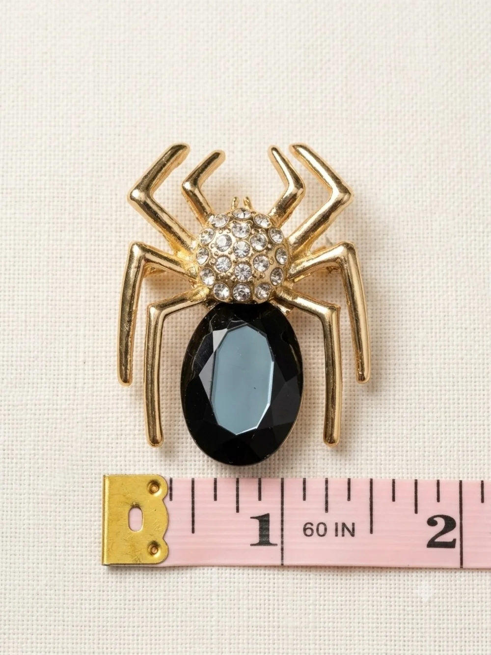 Gold Tone Spider Brooch with Black Gem Accent